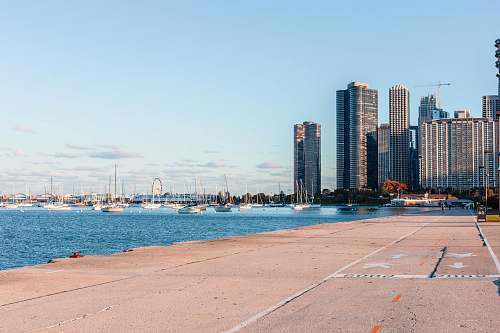 lakefront trail city buldings beside body of water chicago